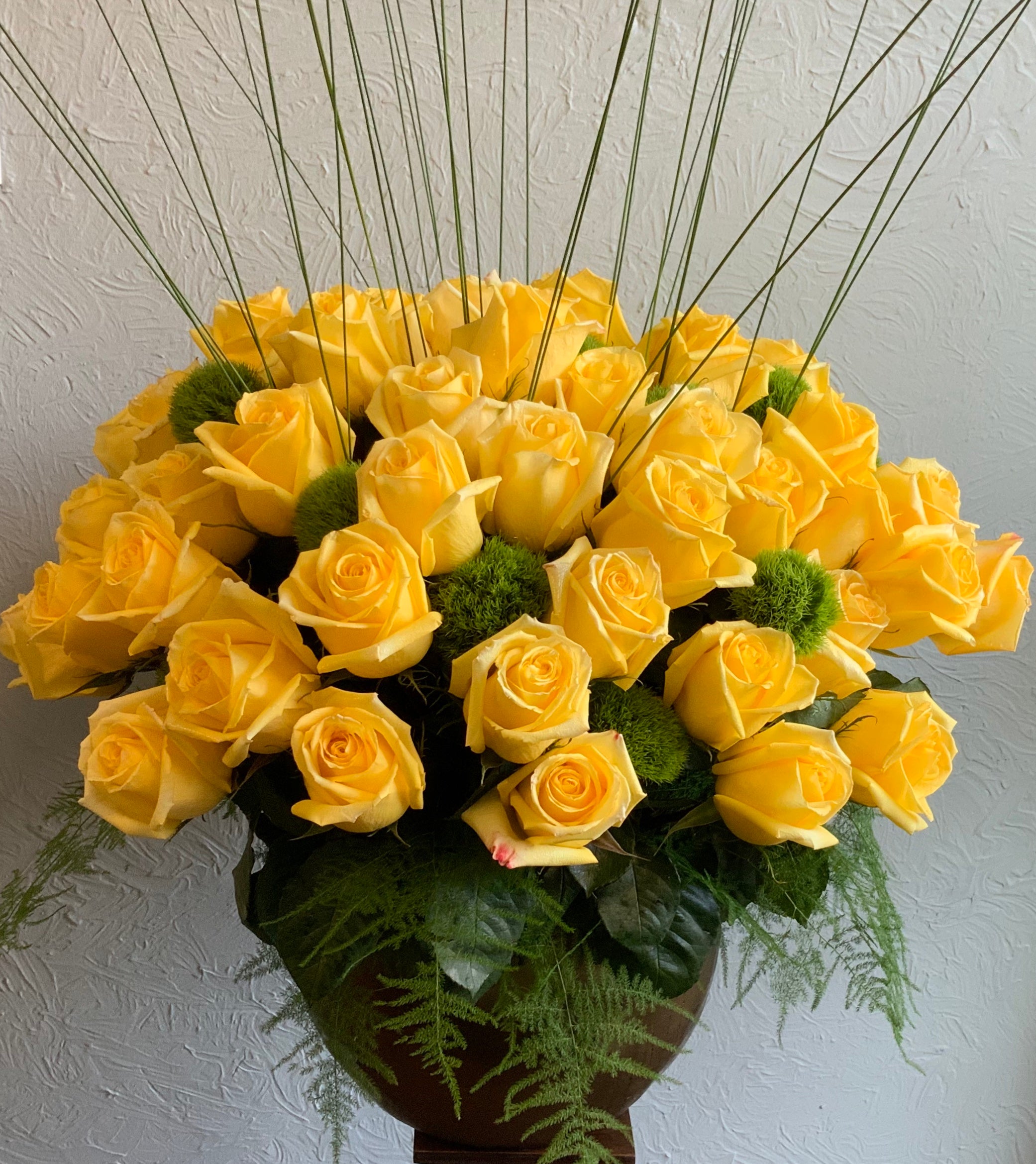 Roses - 5 dozen roses in a vase or urn