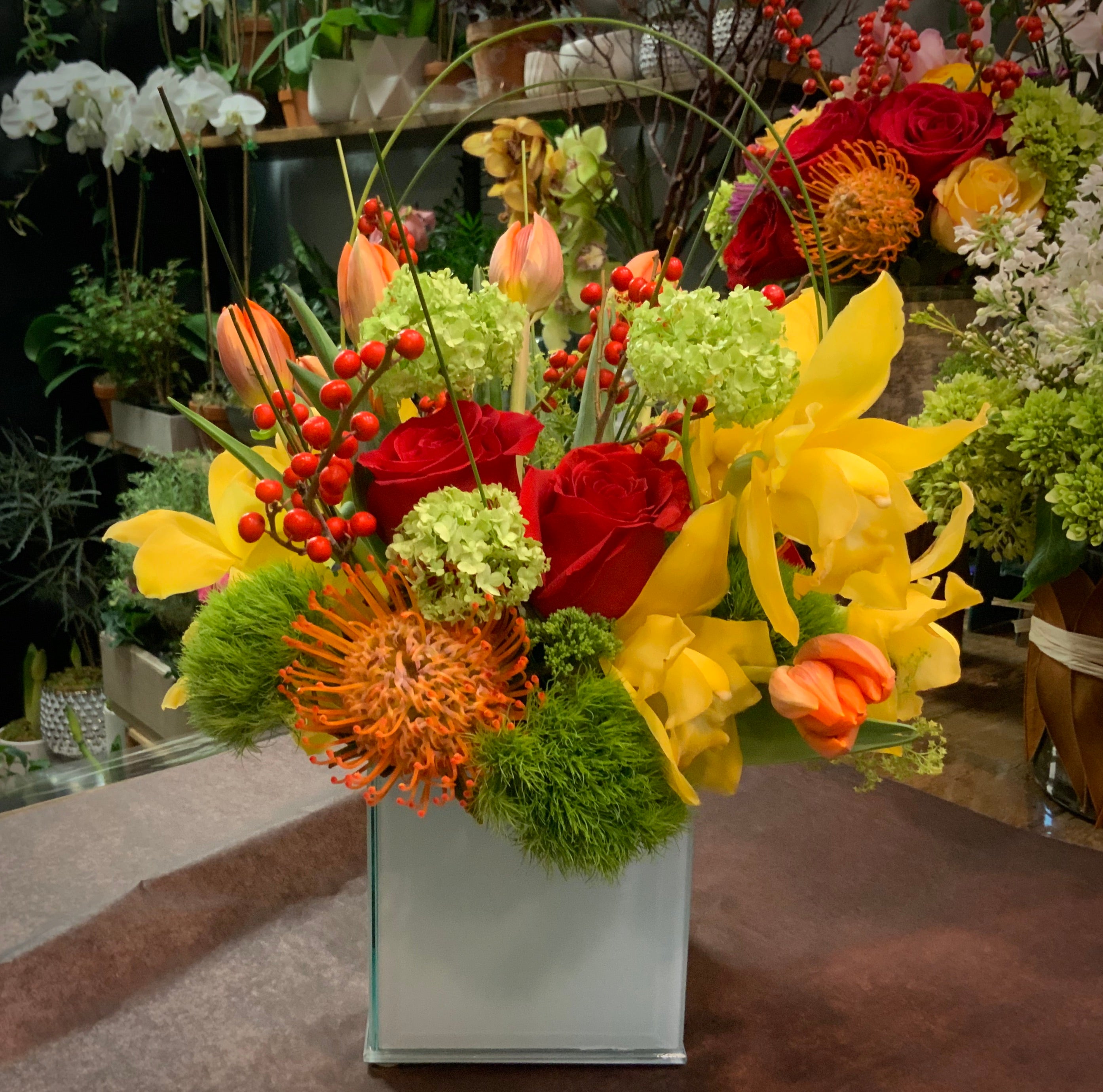 Contemporary arrangement in 6" cube or cylinder- priced as shown