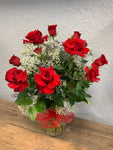 Classic Dozen Roses in a vase with Babies Breath